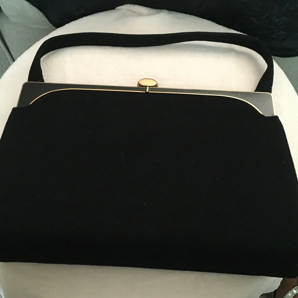 Classic Black Velvet Evening handbag with Gold Accent with fabric lining.